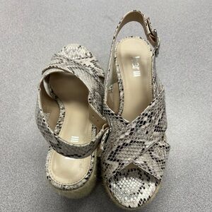 Cute platform animal print sandals. Barely used twice.